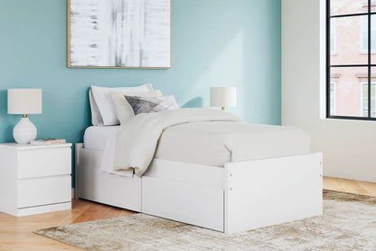 Onita Platform Bed with built-in storage drawers, white finish in a blue bedroom on Tampa Home & Garden Store