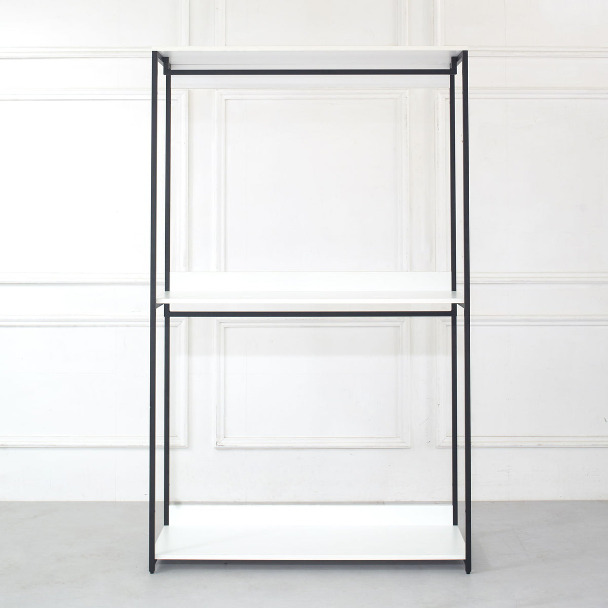 Walk-in closet unit with white adjustable shelves and black powder-coated metal frame on Tampa Home & Garden Store