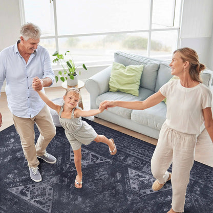 Maval Washable Rug, dark navy abstract area rug by Unique Piece Furniture in a living room on Tampa Home & Garden Store