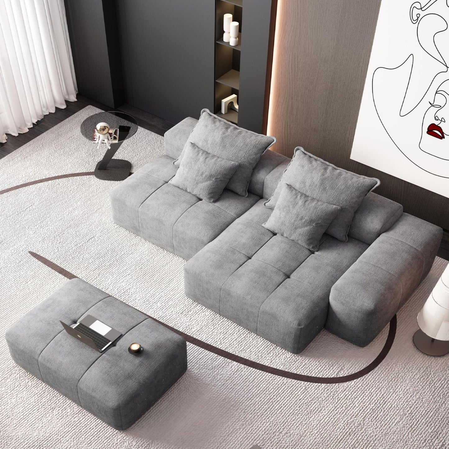 Modular sectional sofa in gray fabric with pillows in a modern living room beside a cabinet on Tampa Home & Garden Store