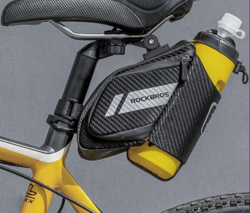 Under-seat bike bag with water bottle pocket and RockBros branding on a yellow road bike on Tampa Home & Garden Store