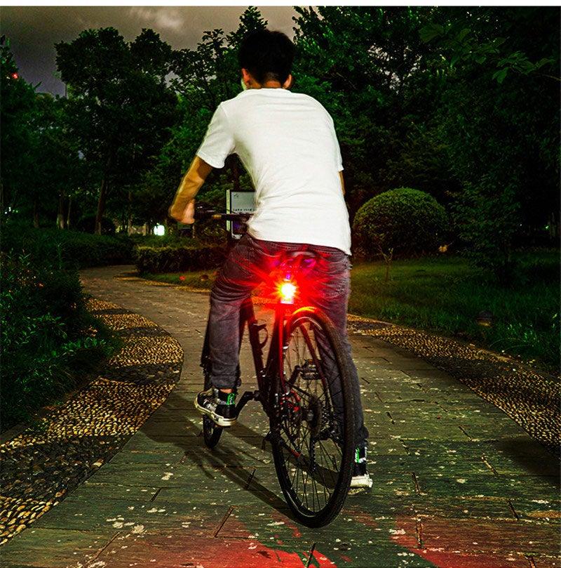 Auto Brake Sensing Tail Light Stevvex for mountain bikes, rear red LED mounted on bike at night on Tampa Home & Garden Store