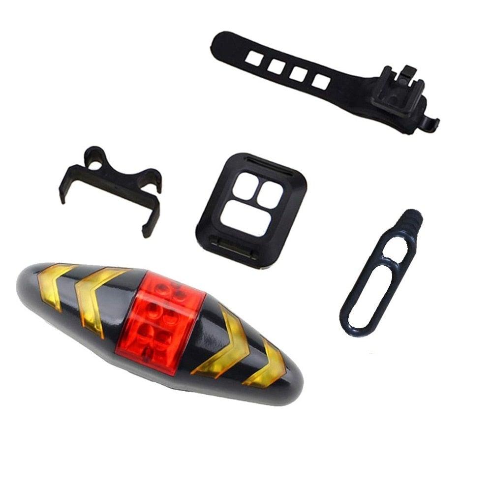 Stevvex bike signal wireless rear light with red LED, black housing, yellow chevrons on Tampa Home & Garden Store