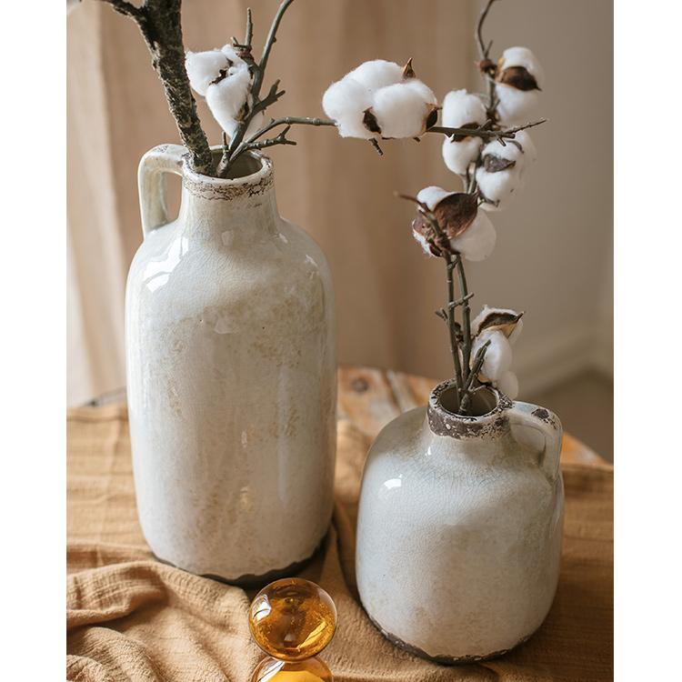 Two Binglie glazed pottery vases with single handles in pale cream glaze on Tampa Home & Garden Store