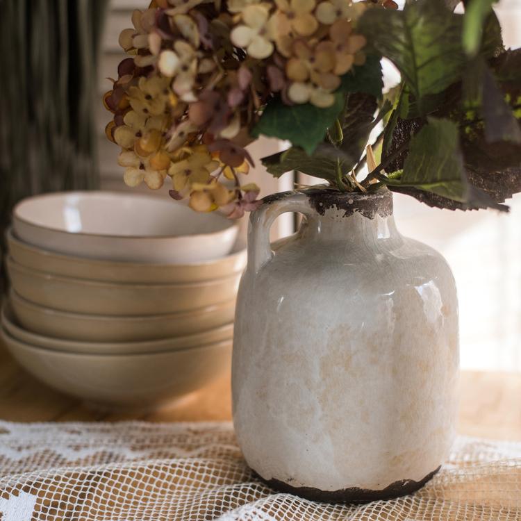 Binglie glazed pottery vase with single handle in cream glaze, with dried hydrangea on Tampa Home & Garden Store
