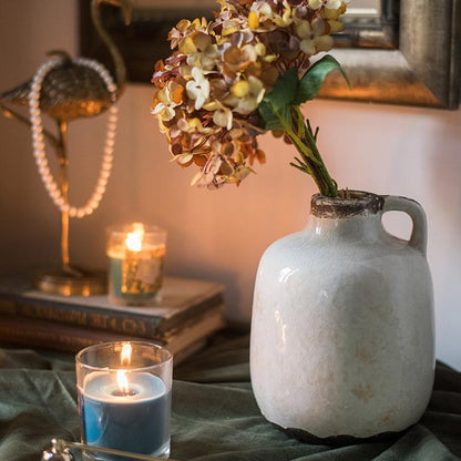 Binglie Glazed Pottery Vase with Single Handle in pale cream glaze holding dried hydrangea on Tampa Home & Garden Store