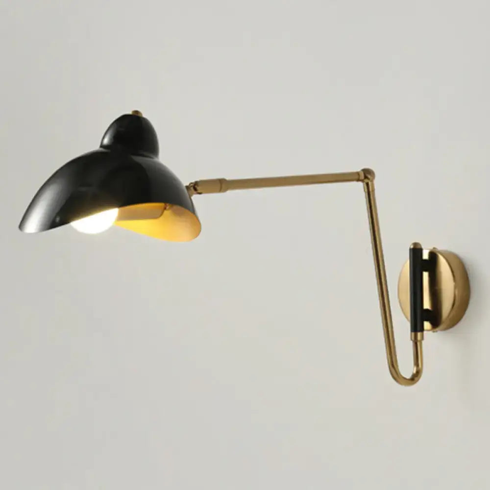 Brass adjustable wall sconce with black shade and gold interior by Decorbites on Tampa Home & Garden Store