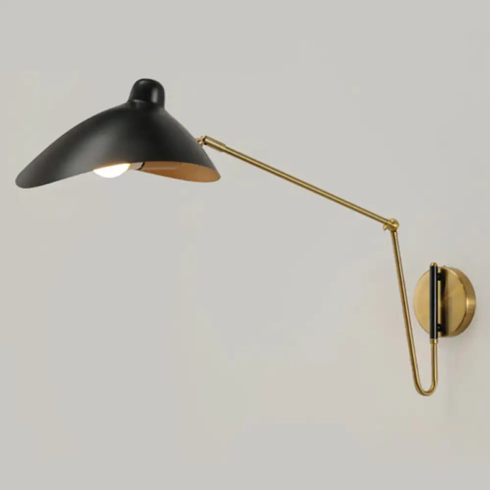 Brass adjustable wall sconce with black shade and gold arm by Decorbites on Tampa Home & Garden Store