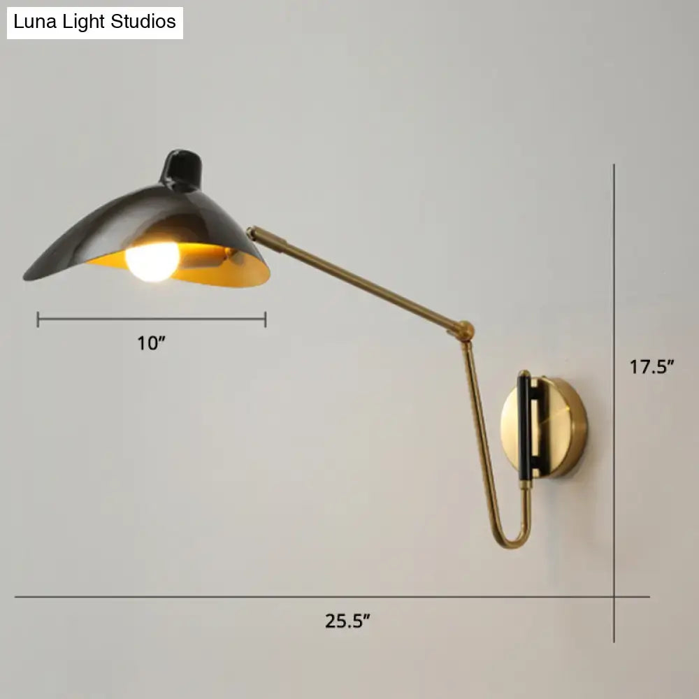 Brass adjustable wall sconce with black shade and gold interior extendable arm wall mount on Tampa Home & Garden Store