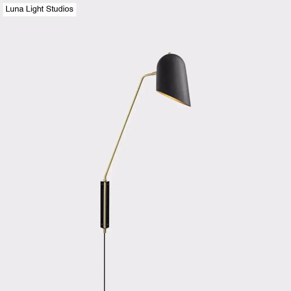 Black Metal Reading Sconce with brass adjustable arm and black shade by Decorbites on Tampa Home & Garden Store