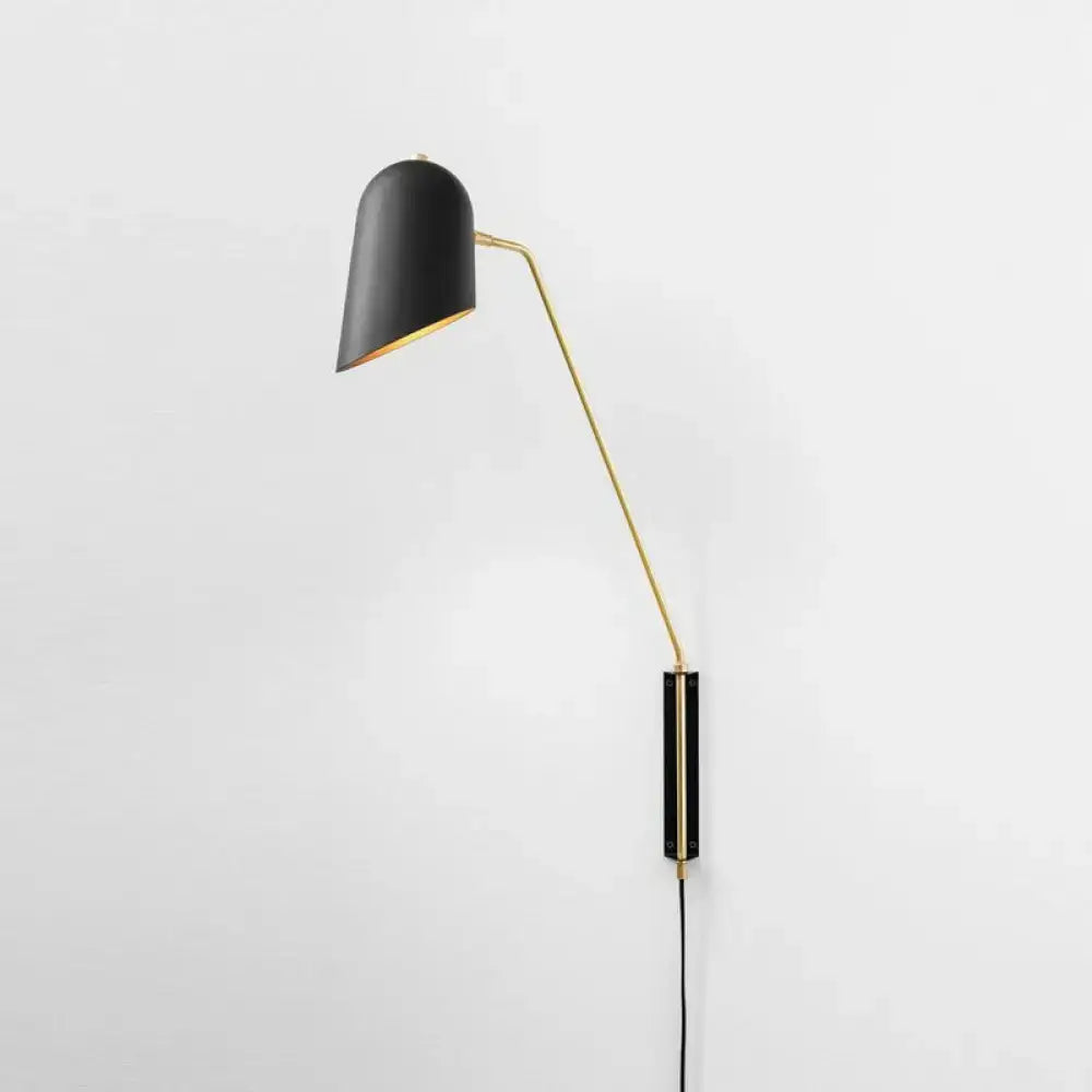 Black metal reading sconce with brass arm and black shade by Decorbites wall lamp on Tampa Home & Garden Store