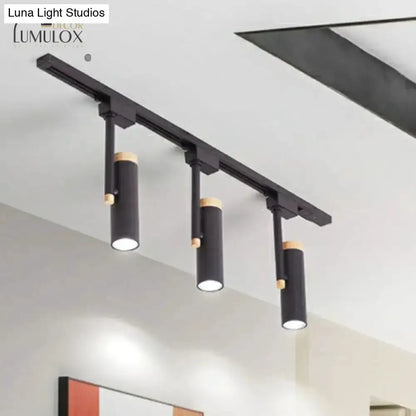 Three-light black track ceiling lamp with wood accents by Decorbites for kitchen on Tampa Home & Garden Store
