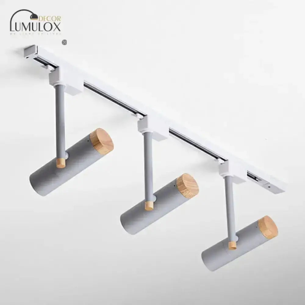 Black and wood three-light track ceiling lamp with gray cylindrical heads Decorbites on Tampa Home & Garden Store