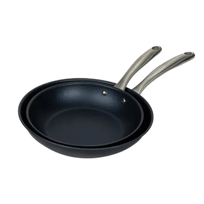 Carbon steel frying pan with dual stainless handles, black interior on Tampa Home & Garden Store