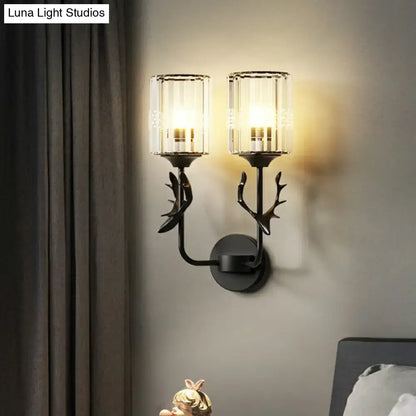 Black Antler Crystal Sconce with dual glass-shade bulbs, black metal wall mount by Decorbites on Tampa Home & Garden Store