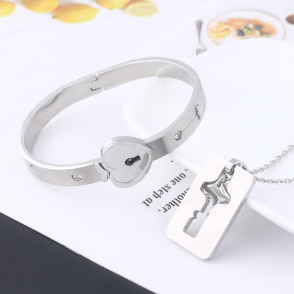 Bracelet and necklace set in silver-tone stainless steel with heart lock and key pendant on Tampa Home & Garden Store