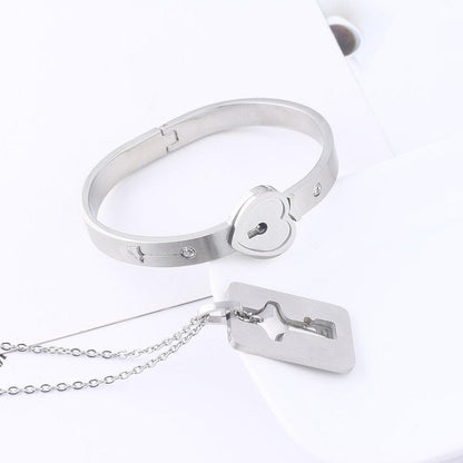 Stevvex stainless steel heart lock bracelet with key pendant and tag chain on Tampa Home & Garden Store