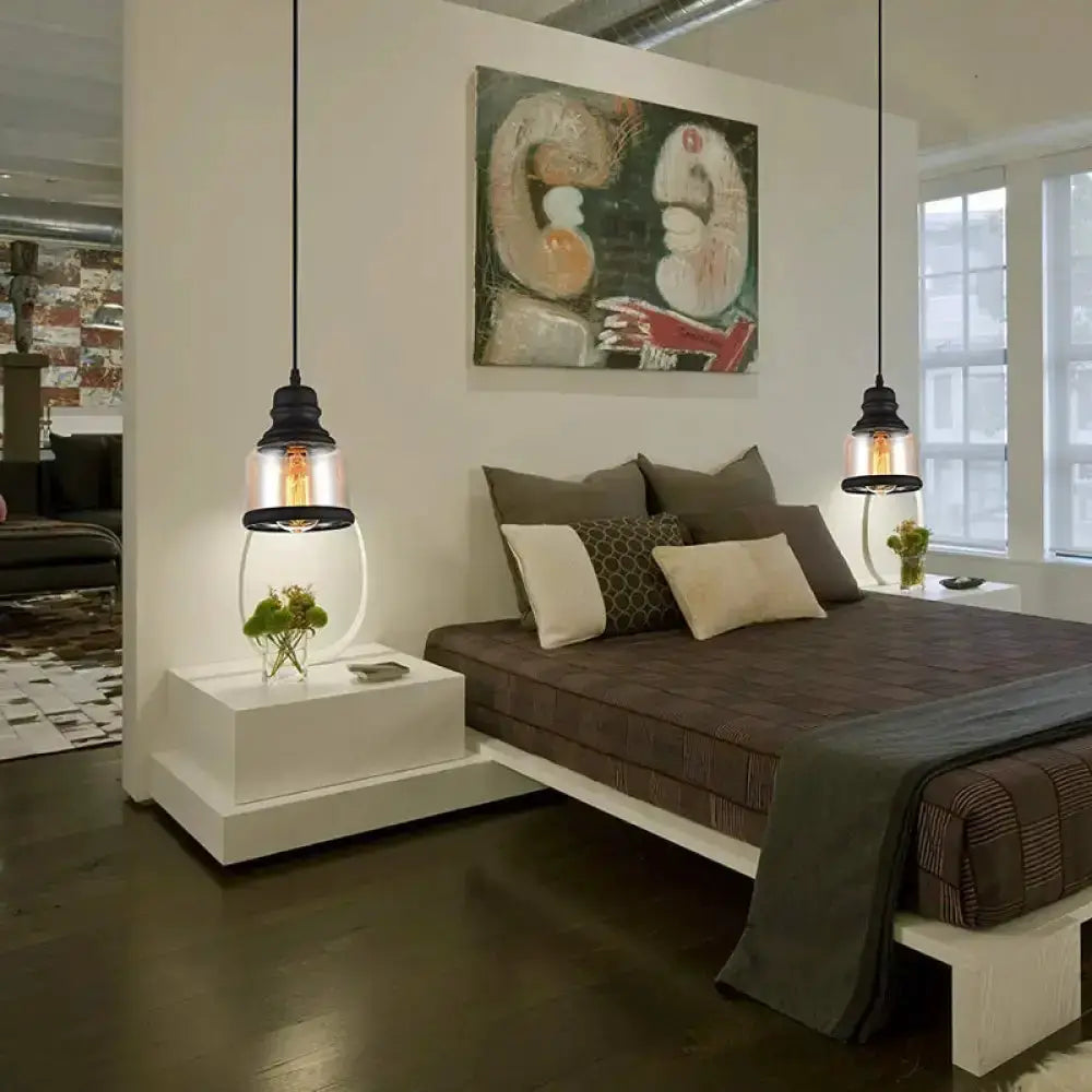 Industrial black cylinder pendant lights with clear glass shades, pair over bedroom nightstands on Tampa Home & Garden Store