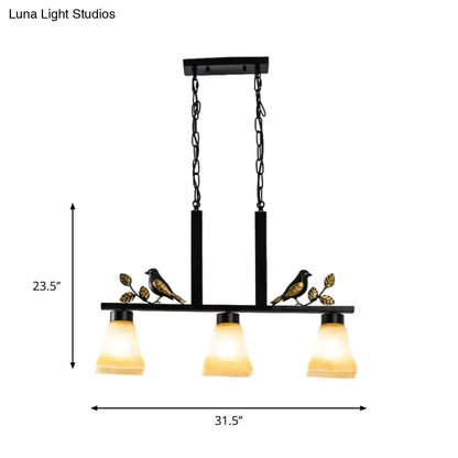 Ornate island light pendant black & gold with tan glass shades and bird accents Decorbites on Tampa Home & Garden Store
