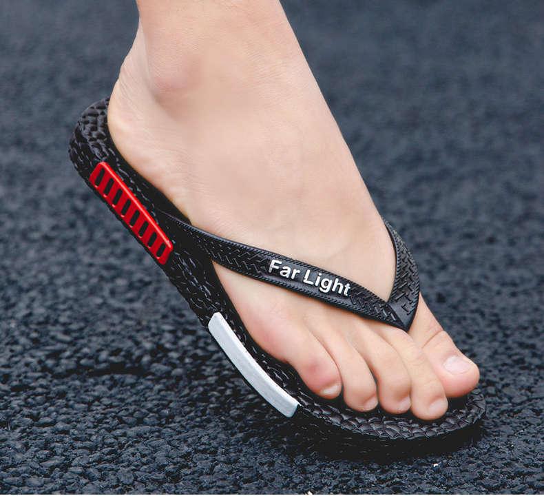 Stevvex black men's flip flop sandal with textured strap and red side accent on Tampa Home & Garden Store