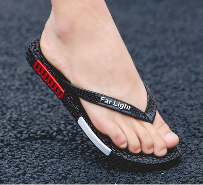 Stevvex black men's flip flop sandal with textured strap and red side accent on Tampa Home & Garden Store