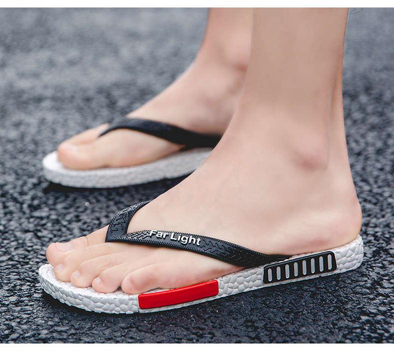 Stevvex black men's leather flip flops with breathable mesh strap and textured white sole on Tampa Home & Garden Store