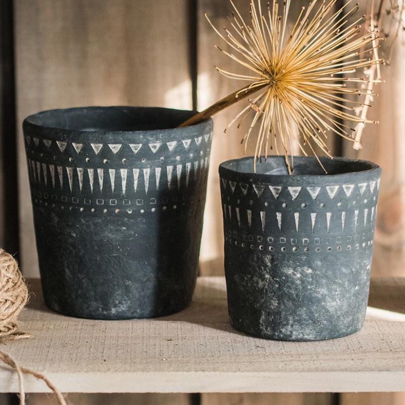 Black pottery cement planter pair with white geometric bands; large and small RusticReach on Tampa Home & Garden Store