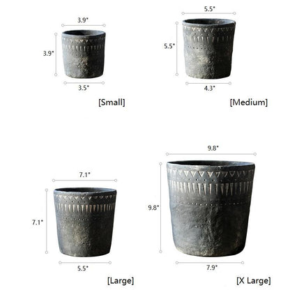 Black cement planter set by RusticReach; four sizes with geometric pattern on Tampa Home & Garden Store