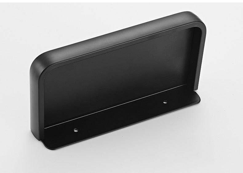 Stevvex matte black toilet paper holder with integrated shelf and mounting holes on Tampa Home & Garden Store