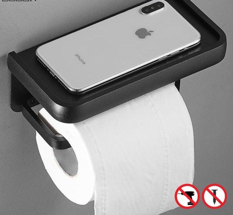 Stevvex black matte toilet paper holder with shelf and adhesive mount for bathroom storage on Tampa Home & Garden Store