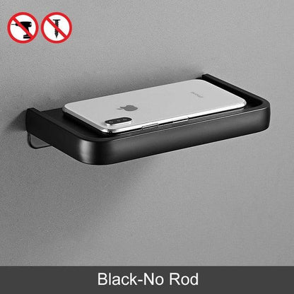 Black matte toilet paper holder with shelf, adhesive wall mount, bathroom organizer with phone on top on Tampa Home & Garden Store