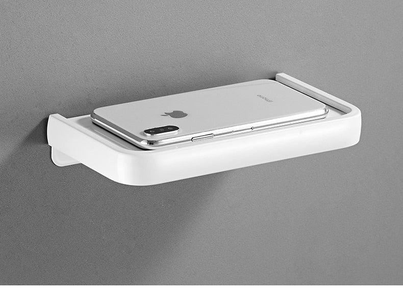 Stevvex toilet paper holder with shelf, white adhesive wall mount on Tampa Home & Garden Store