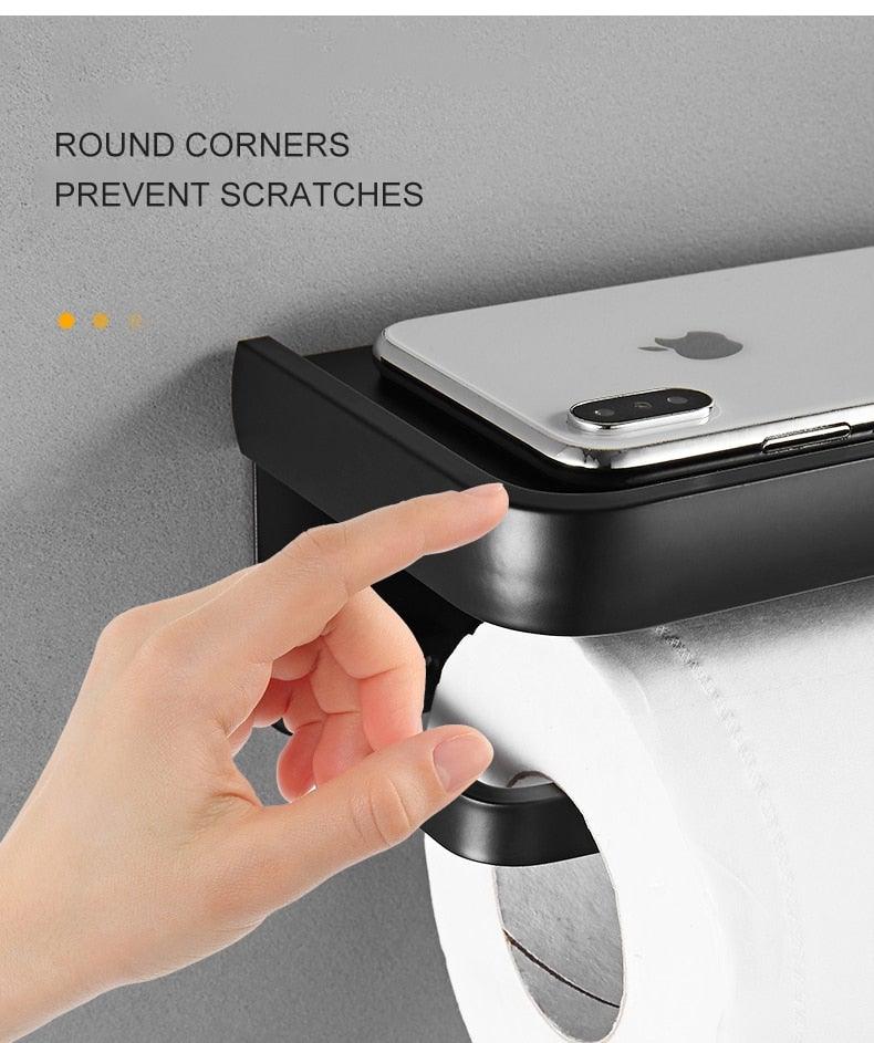 Toilet paper holder with matte black finish and top storage shelf, adhesive mount on Tampa Home & Garden Store