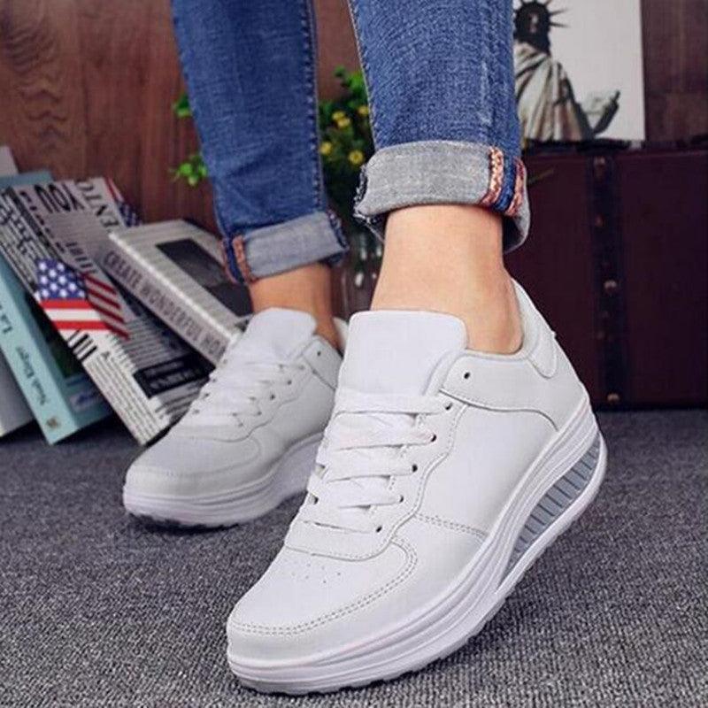 Stevvex white leather sneakers pair, lace-up low-top casual sport with thick sole on Tampa Home & Garden Store