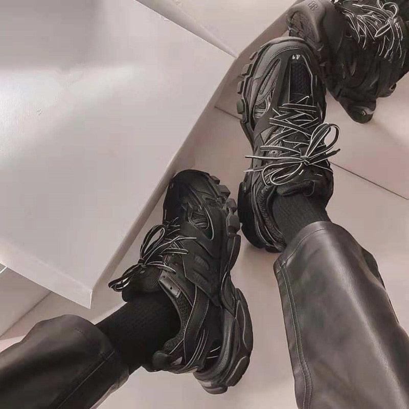 Pair of Stevvex black breathable mesh sneakers with chunky rugged outsole and lace details on Tampa Home & Garden Store