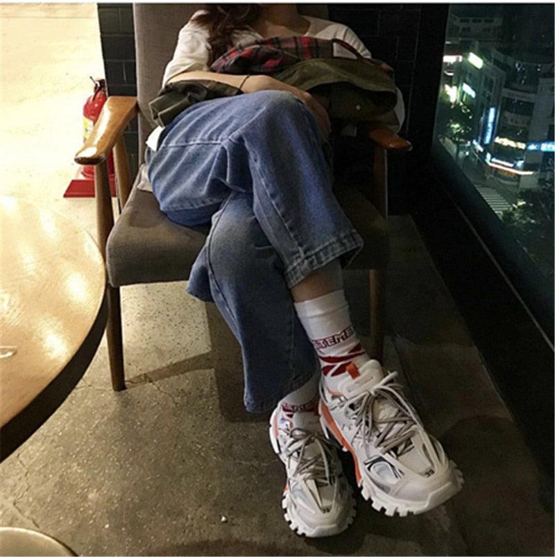Stevvex women's breathable mesh sneakers white with orange accents, chunky sole on Tampa Home & Garden Store