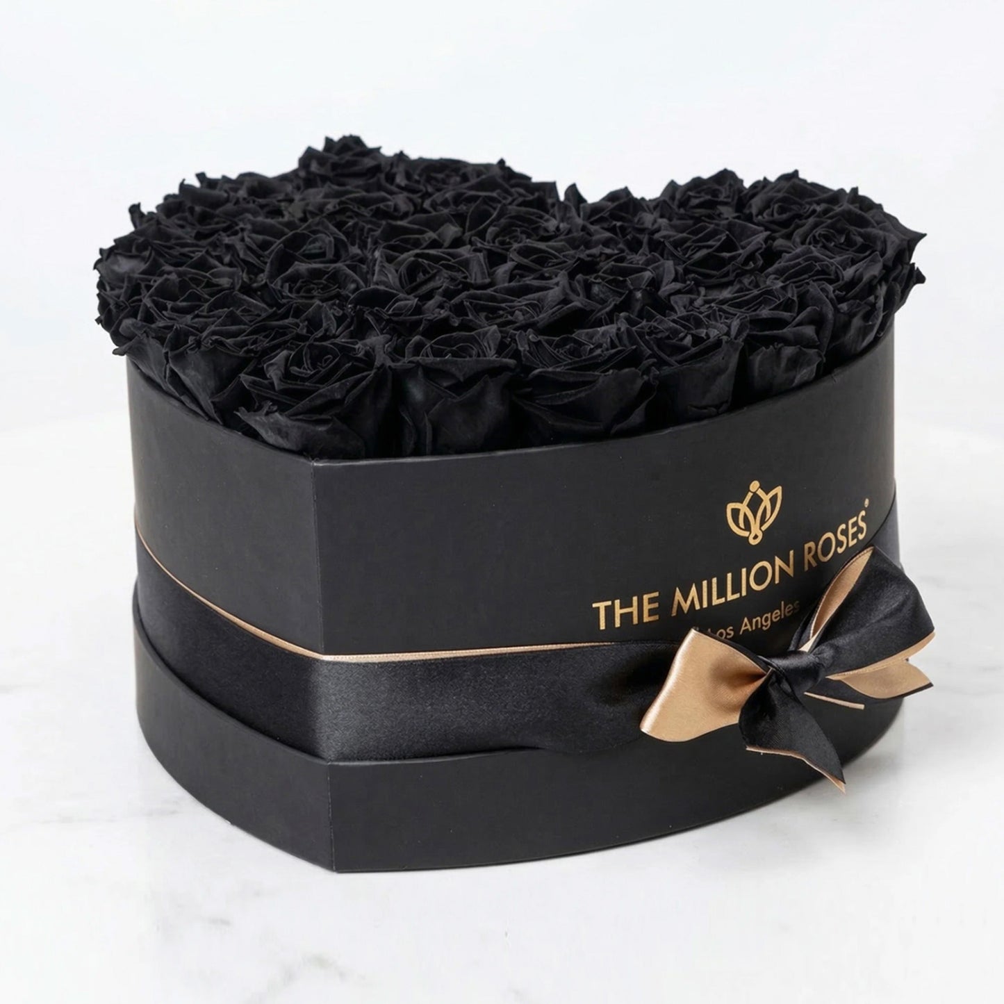 Heart Black Box by The Million Roses with black shredded filler and satin ribbon on Tampa Home & Garden Store