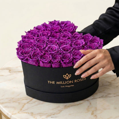 Heart Black Box of bright purple roses by The Million Roses, hand presented on Tampa Home & Garden Store