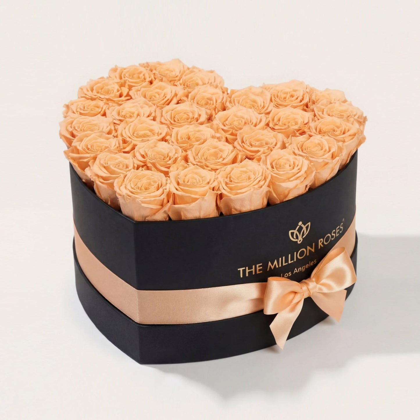 Heart Black Box filled with dozens of peach eternity roses by The Million Roses on Tampa Home & Garden Store