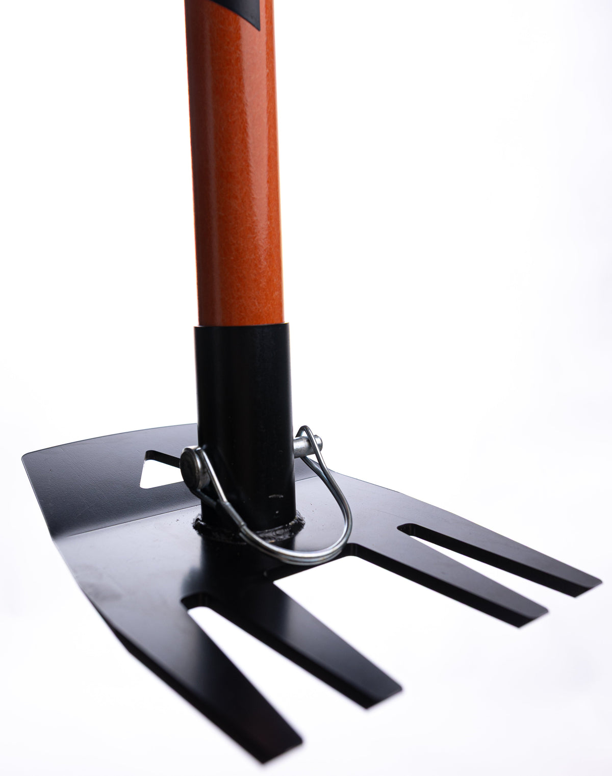 Blaze orange tool shaft with black collar and mounting clip atop a perforated black base on Tampa Home & Garden Store