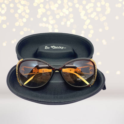 Bling Stone Sunglasses with gold beaded rim and amber lenses in a black case on Tampa Home & Garden Store
