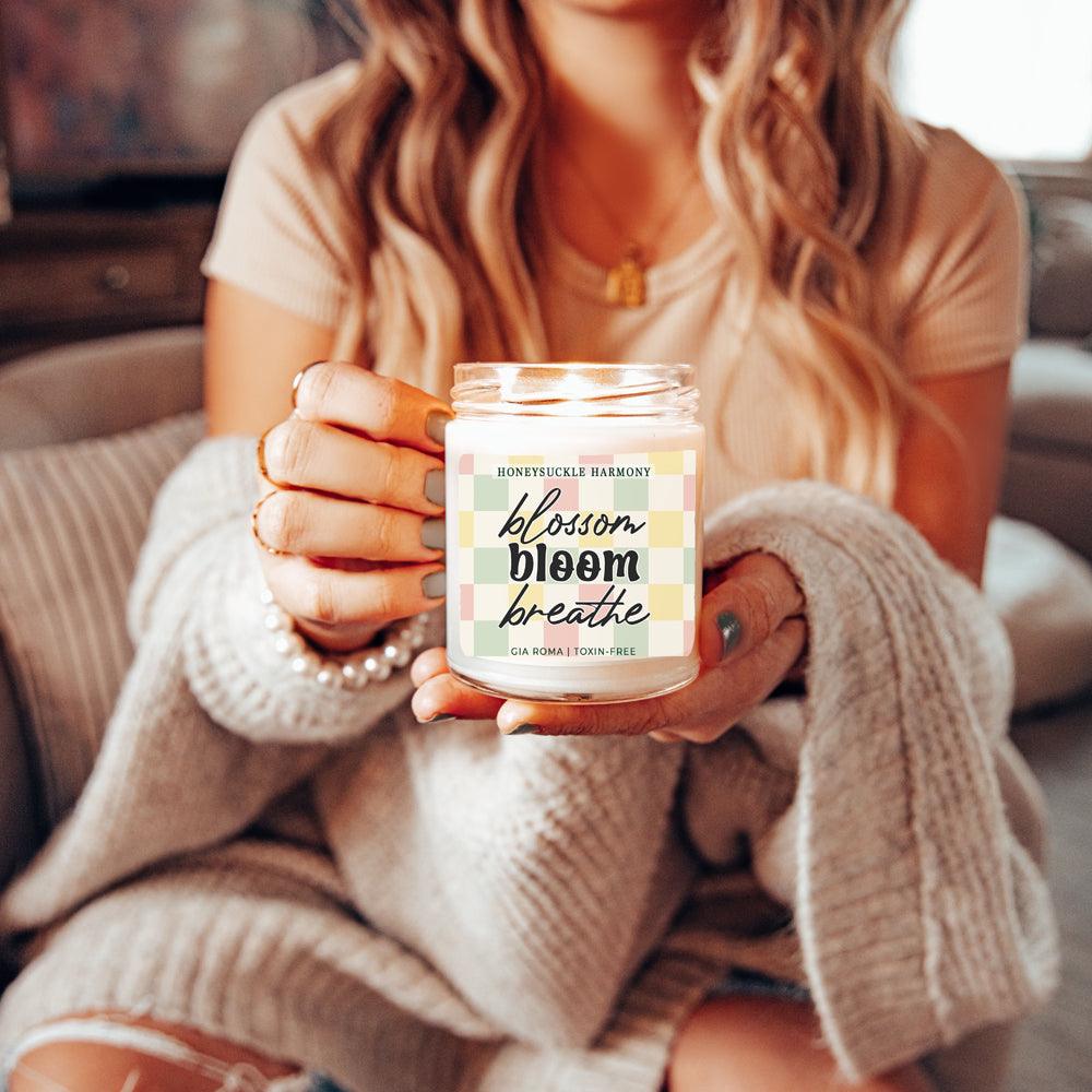 Honeysuckle Harmony Candle by Gia Roma in a clear glass jar with pastel plaid label on Tampa Home & Garden Store