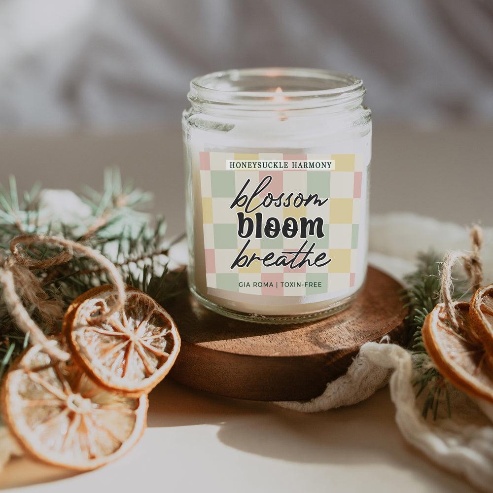 Honeysuckle Harmony candle, glass jar by Gia Roma with pastel check label on Tampa Home & Garden Store