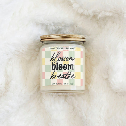 Honeysuckle Harmony Candle by Gia Roma, pastel checkered label on glass jar with gold lid on Tampa Home & Garden Store