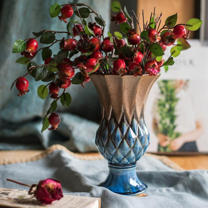 Blue gold grid pattern glazed ceramic vase by RusticReach filled with red berry stems on Tampa Home & Garden Store