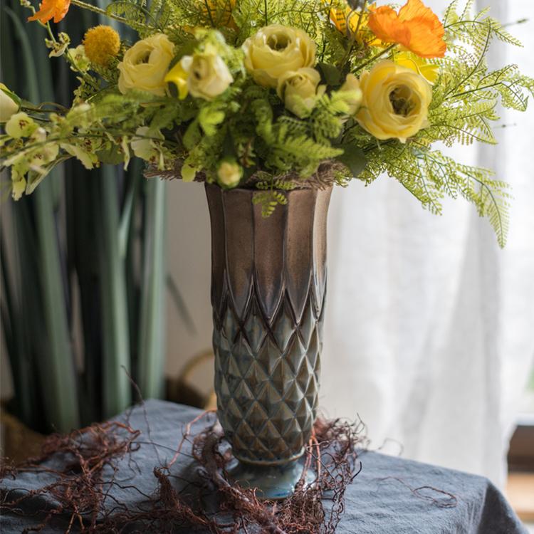 Blue Gold Grid Pattern Glazed Ceramic Vase RusticReach holding yellow roses with greenery on Tampa Home & Garden Store