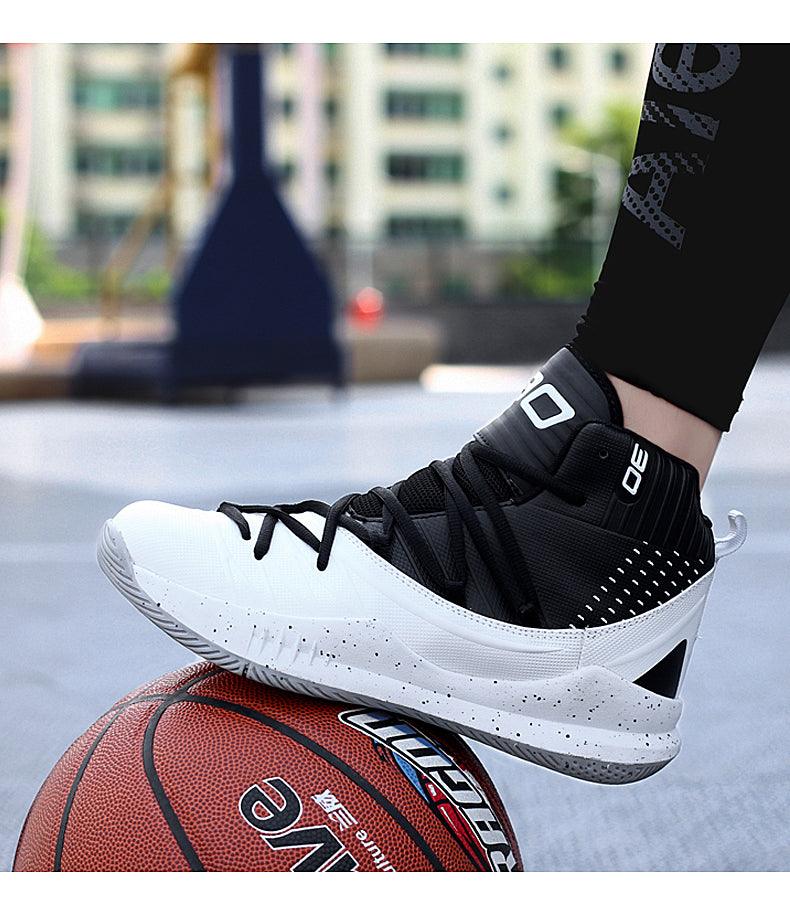 Stevvex black and white high-top basketball sneakers with speckled midsole on a basketball on Tampa Home & Garden Store