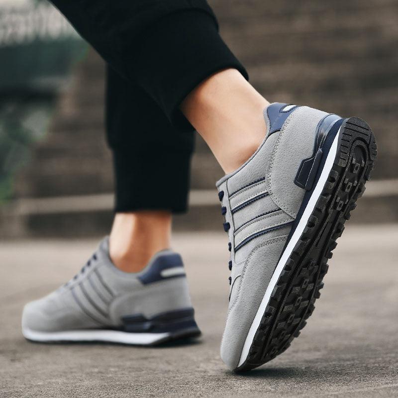 Stevvex blue grey sneakers pair with artificial leather upper and rugged outsole on Tampa Home & Garden Store