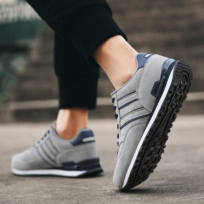 Stevvex blue grey sneakers pair with artificial leather upper and rugged outsole on Tampa Home & Garden Store