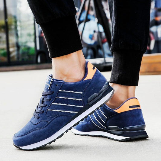 Stevvex blue men's casual sneakers artificial leather with white stripes and orange heel on Tampa Home & Garden Store